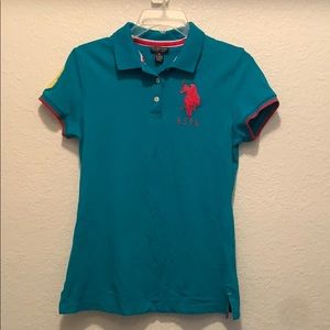 Blue, pink, and yellow U.S Polo Assn. shirt